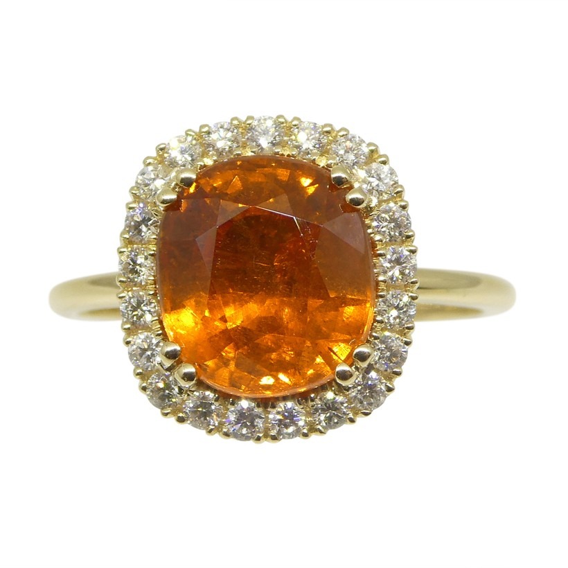Fanta orange garnet and diamond halo ring